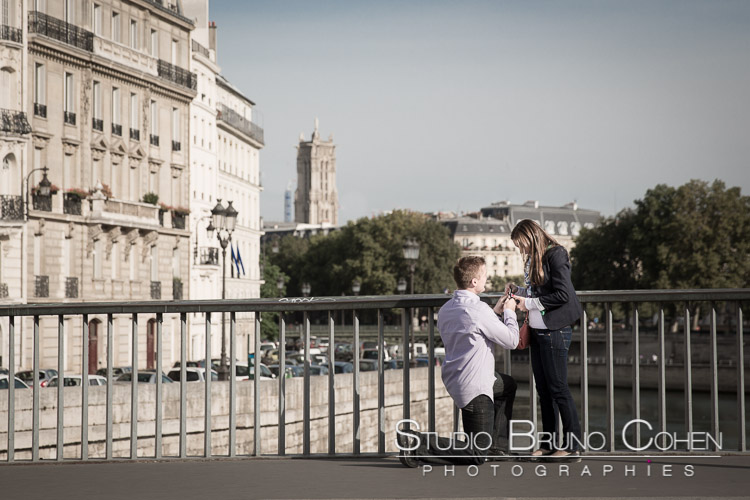 surprise proposal in paris couple in love focus ring at sunrise emotion