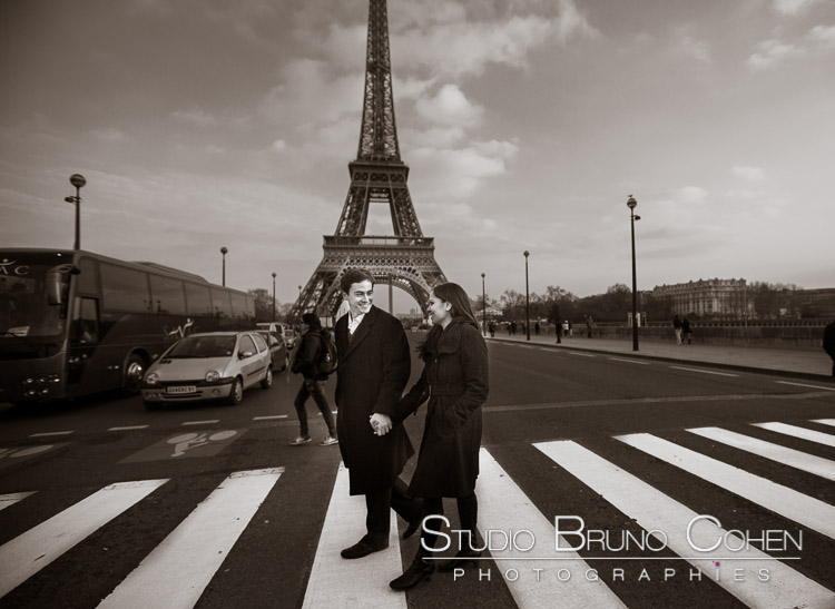 portrait couple crossing road front of Eiffel Tower black and white love smile 