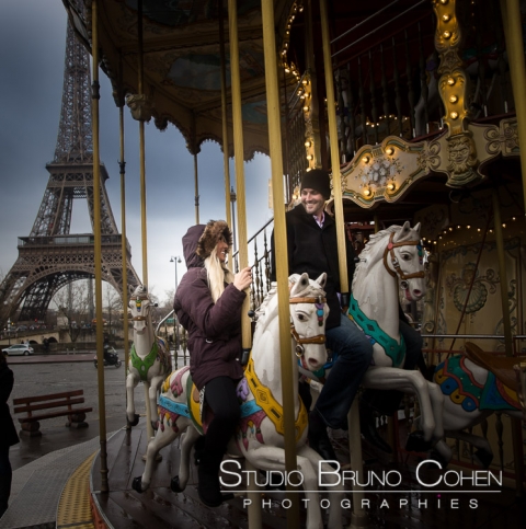 portrait couple riding horses at carousel Eiffel Tower in paris smile love happy valentine day
