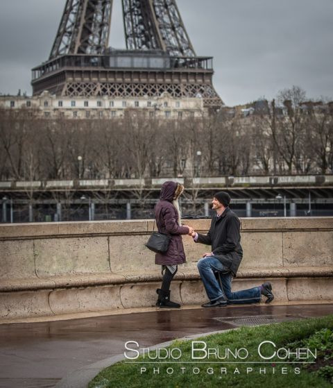surprise proposal in paris valentine day couple in love engagement session front of Eiffel Tower