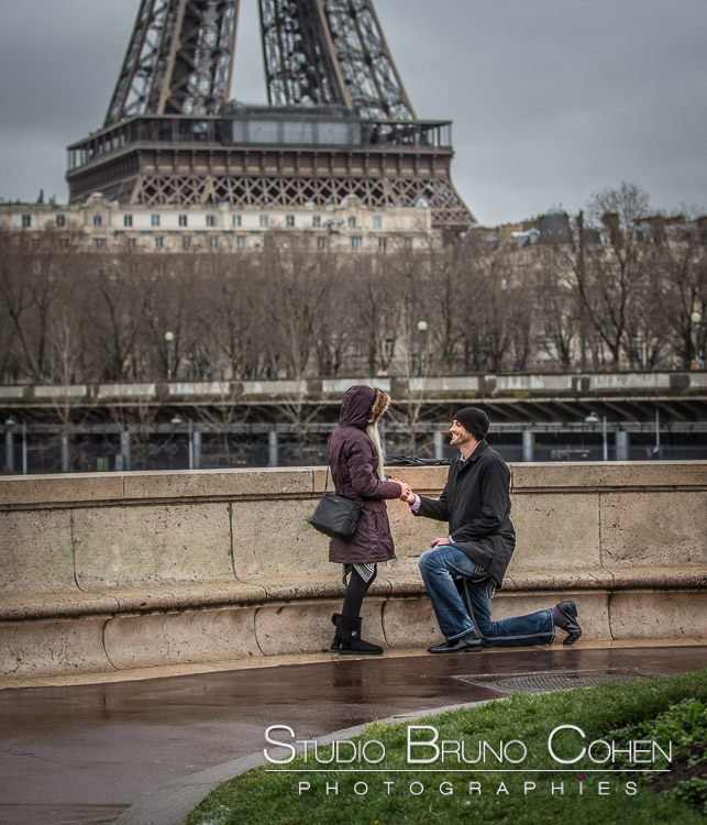 surprise proposal in paris valentine day couple in love engagement session front of Eiffel Tower
