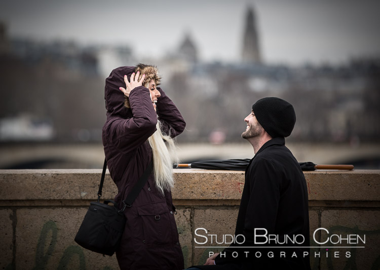 surprise proposal in paris valentine day winter couple in love smile happy emotions cry