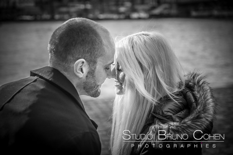 portrait couple forehead against forehead in love in paris at winter black and white