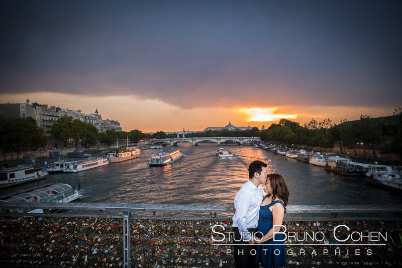 amazing portrait kissing couple on forehead from locks bridge near Eiffel Tower in paris at sunset beautiful emotions love