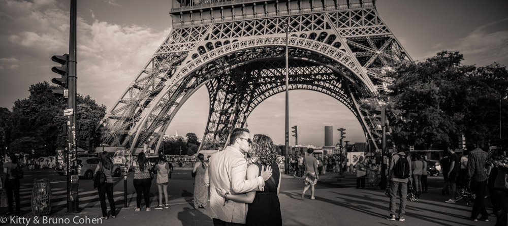 Proposal in paris near Pont Iena black and white couple kiss