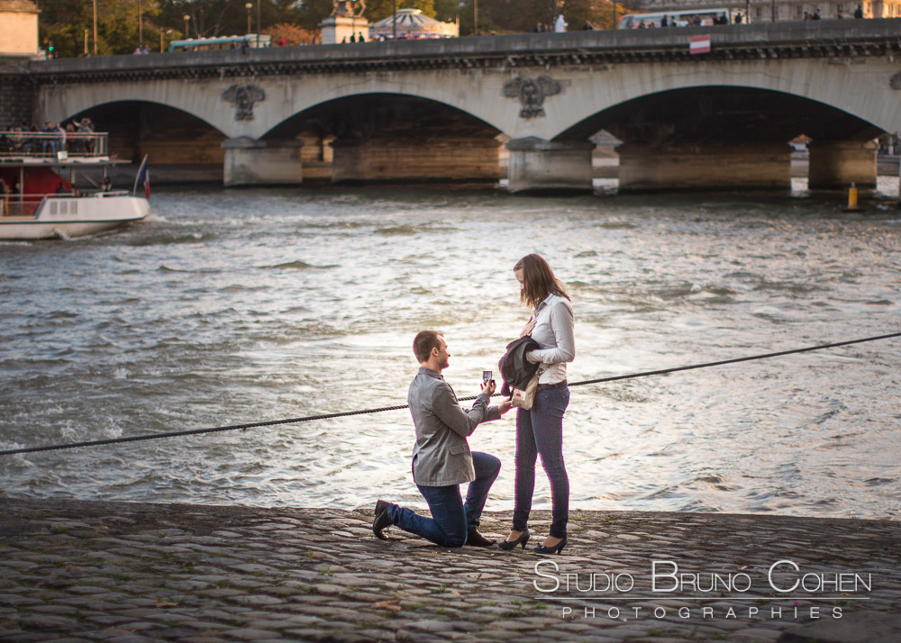 surprise proposal in paris front of eiffel tower couple in love emotions at sunset