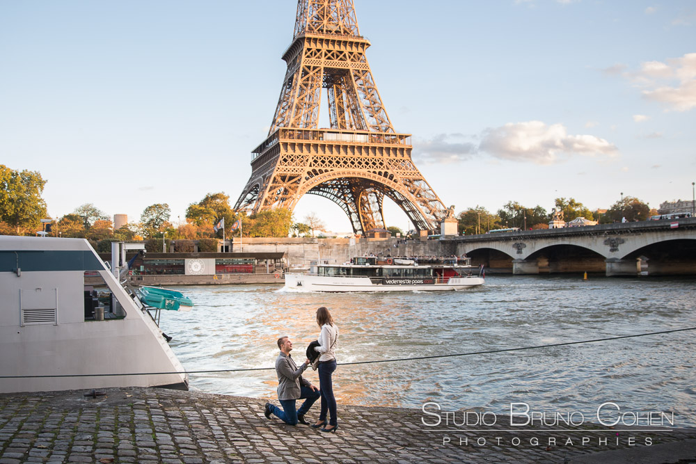 surprise proposal in paris front of eiffel tower couple in love emotions cry at sunset