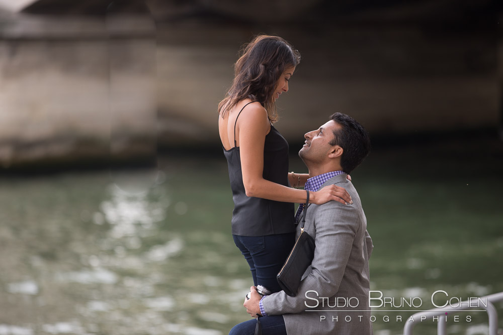portrait couple proposal in paris near eiffel tower look at summer smile emotions cry
