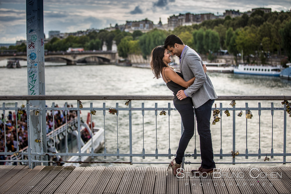 couple face to face hugs love bebilly walkway near eiffel tower in paris proposal at summer 