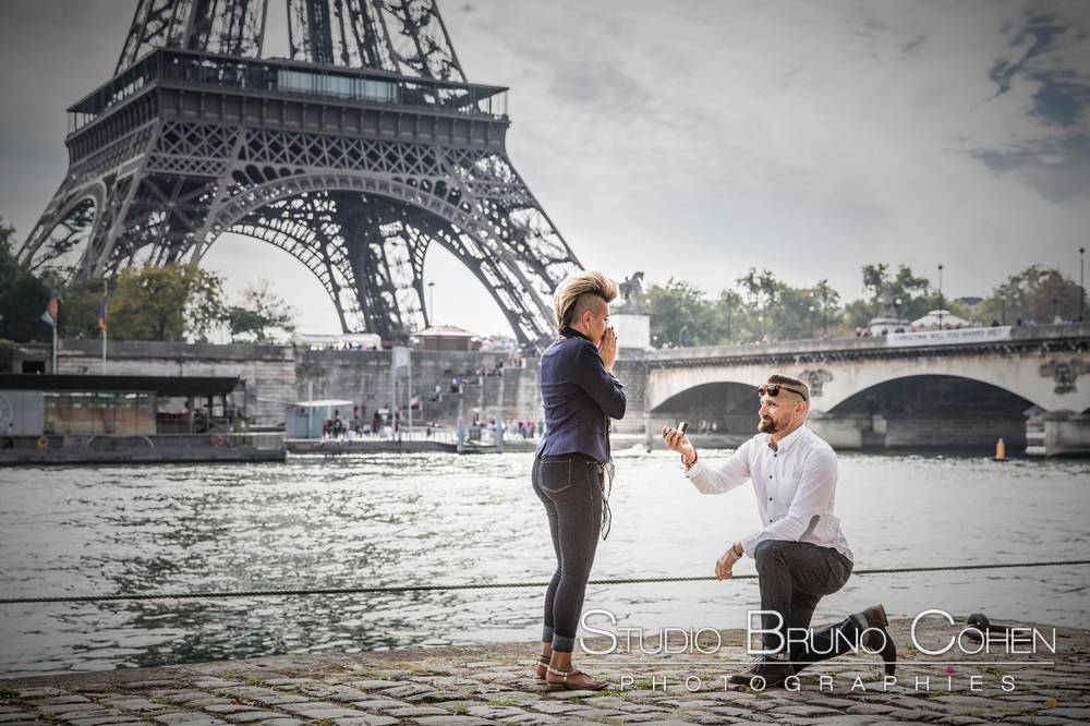 surprise proposal in paris front of eiffel tower couple in love emotions cry love 