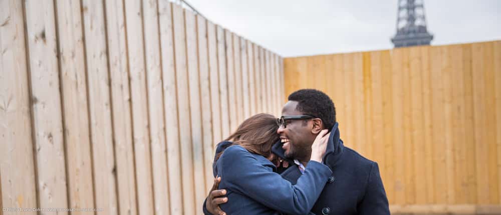 engagement session photographer paris laughing couple from Trocadero front of Eiffel Tower 