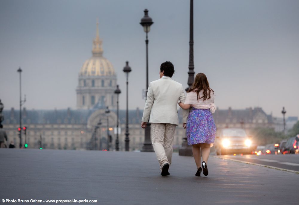 portrait asian couple hand in hand walking in love in paris 