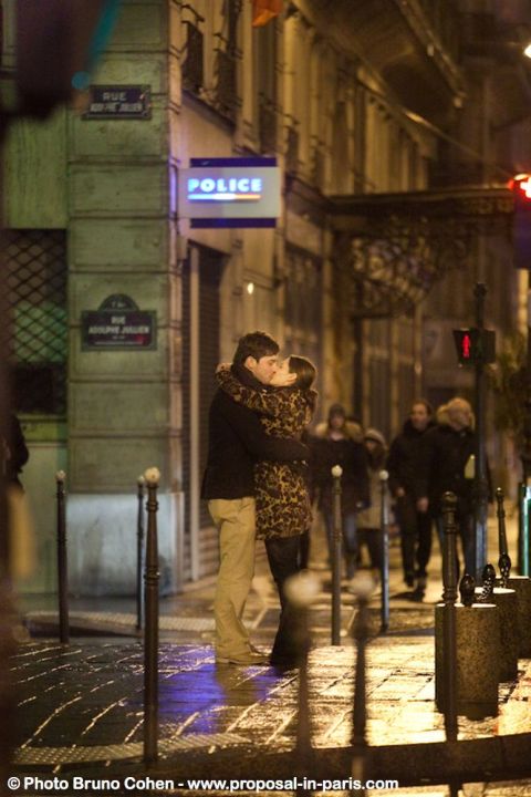 proposal in paris portrait kissing couple at night love kiss notre dame cathedral