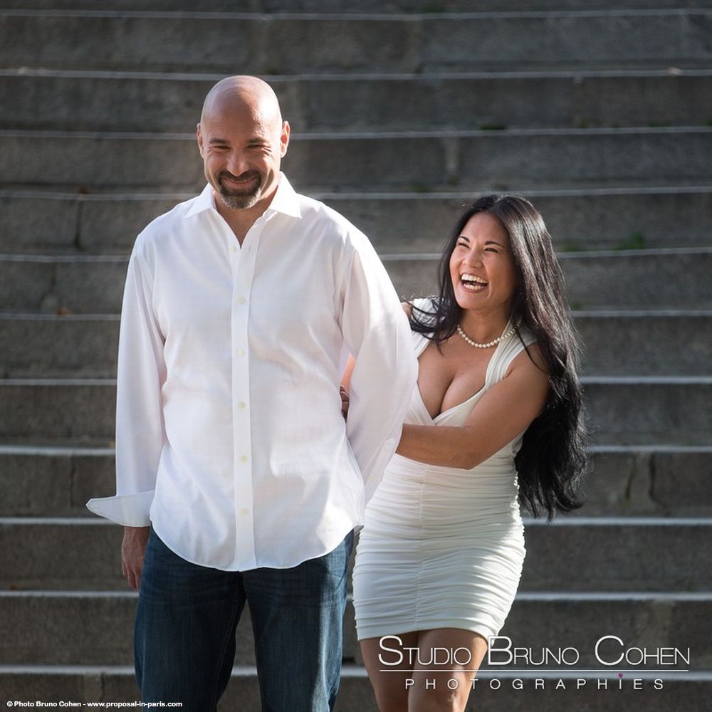 engagement session in paris asian lady couple smile happy love 