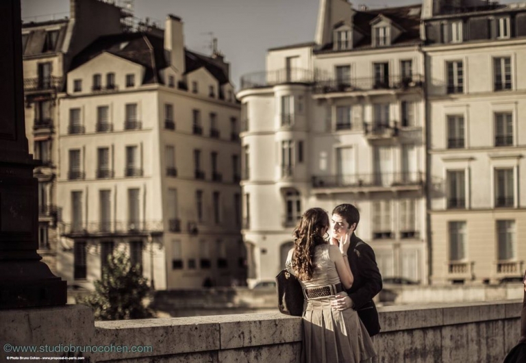 portrait couple in love from paris kiss near notre dame cathedral