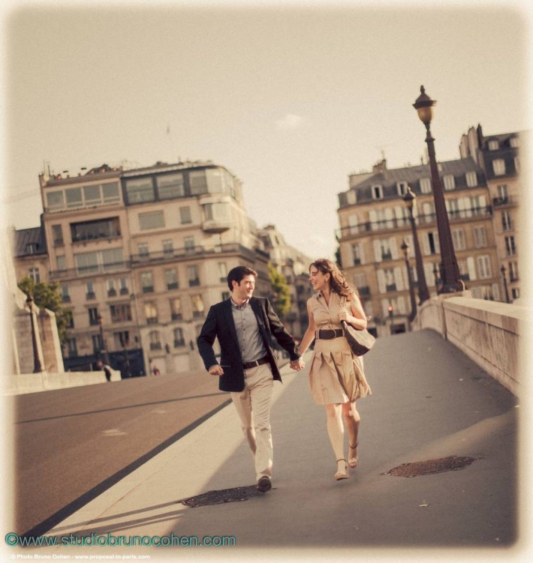 portrait running couple in paris proposal summer at sunrise 