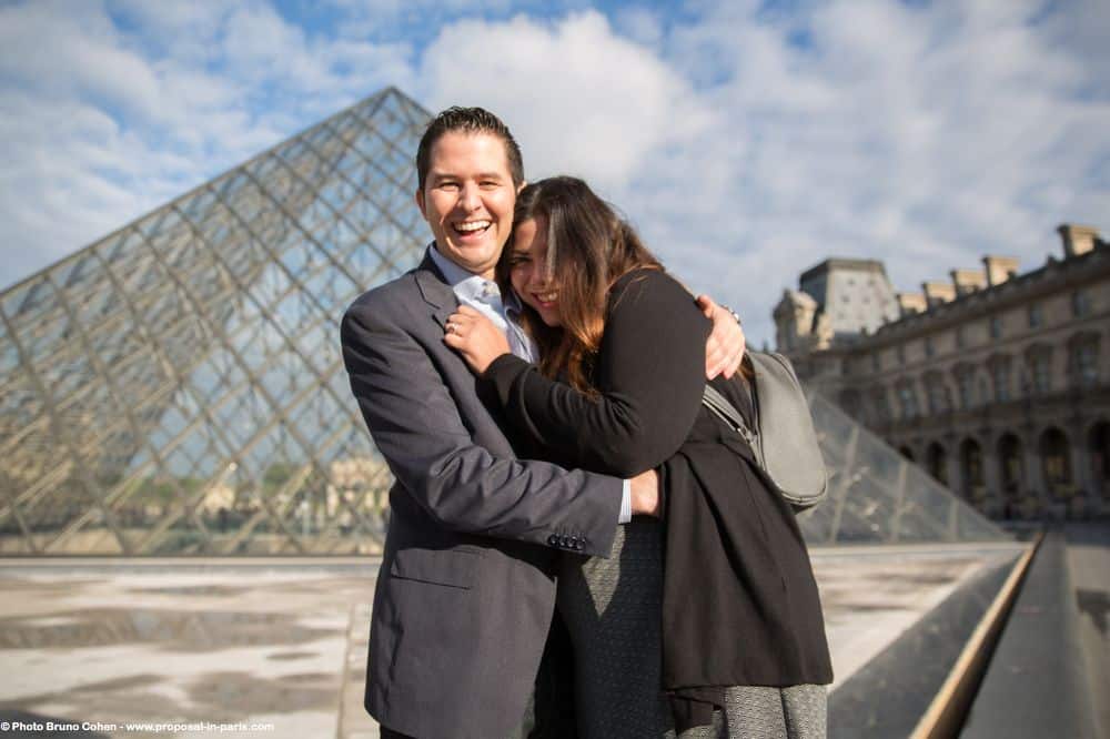 amazing couple from mexico proposal in paris hidden photographer at Louvres Palace