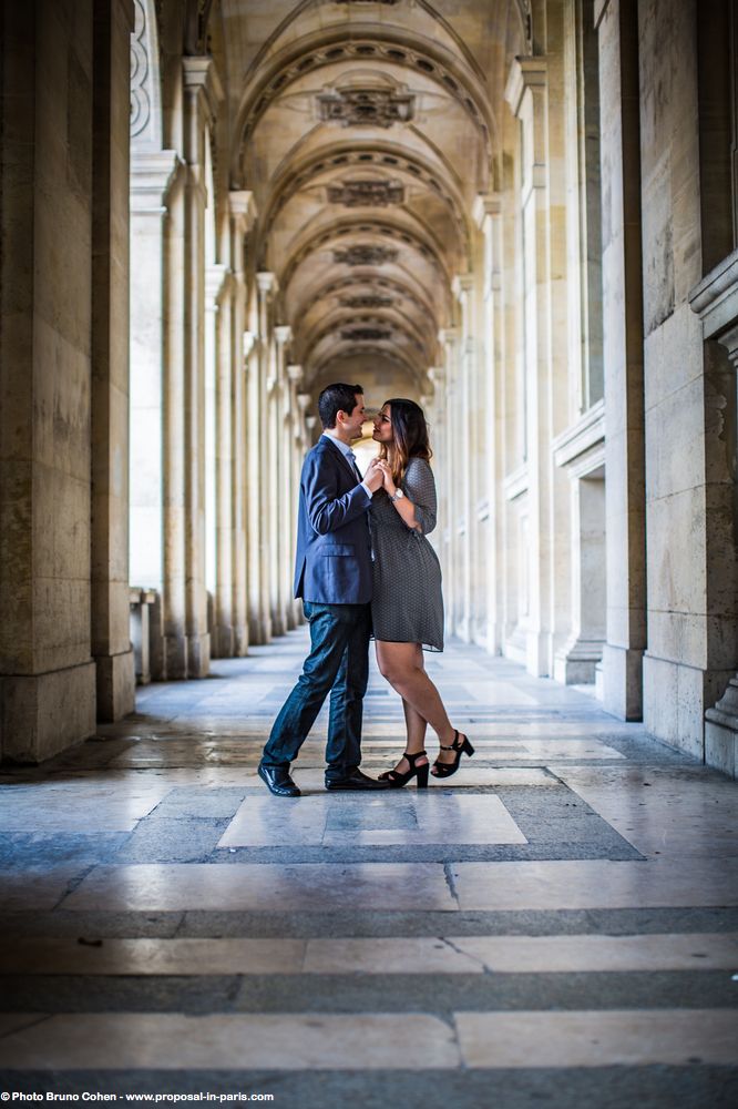 amazing couple from mexico proposal in paris hidden photographer at Louvres Palace
