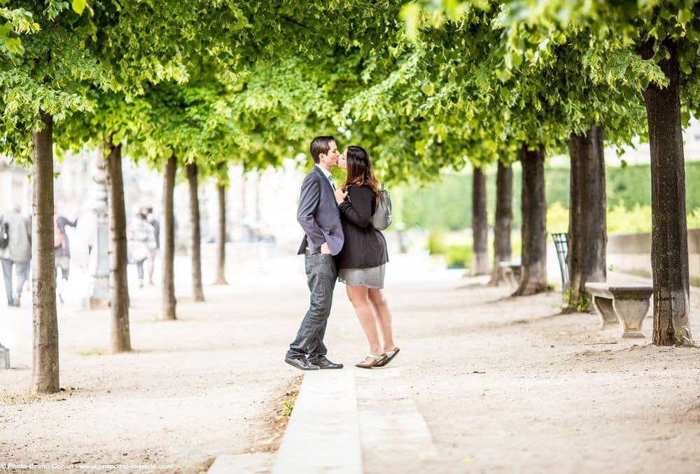 amazing couple from mexico proposal in paris hidden photographer at Louvres Palace