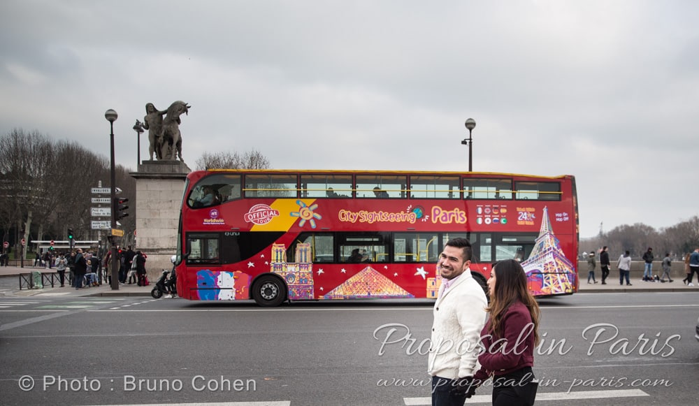 surprise proposal in paris during winter couple in love