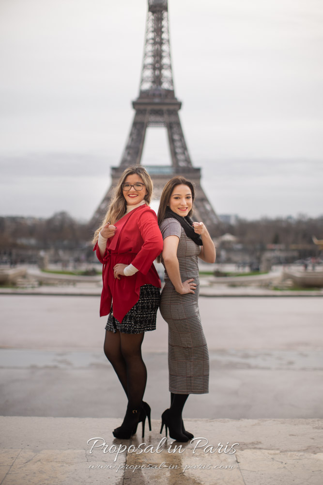 sisters in front of the Eiffel Tower Paris
