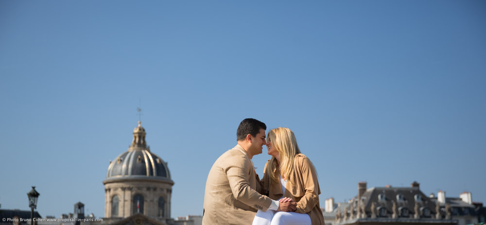 portrait couple in love forehead to forehead in paris blue sky