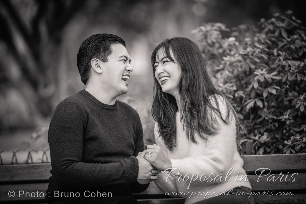 black and white, young couple laughing and holding hands, headshots
