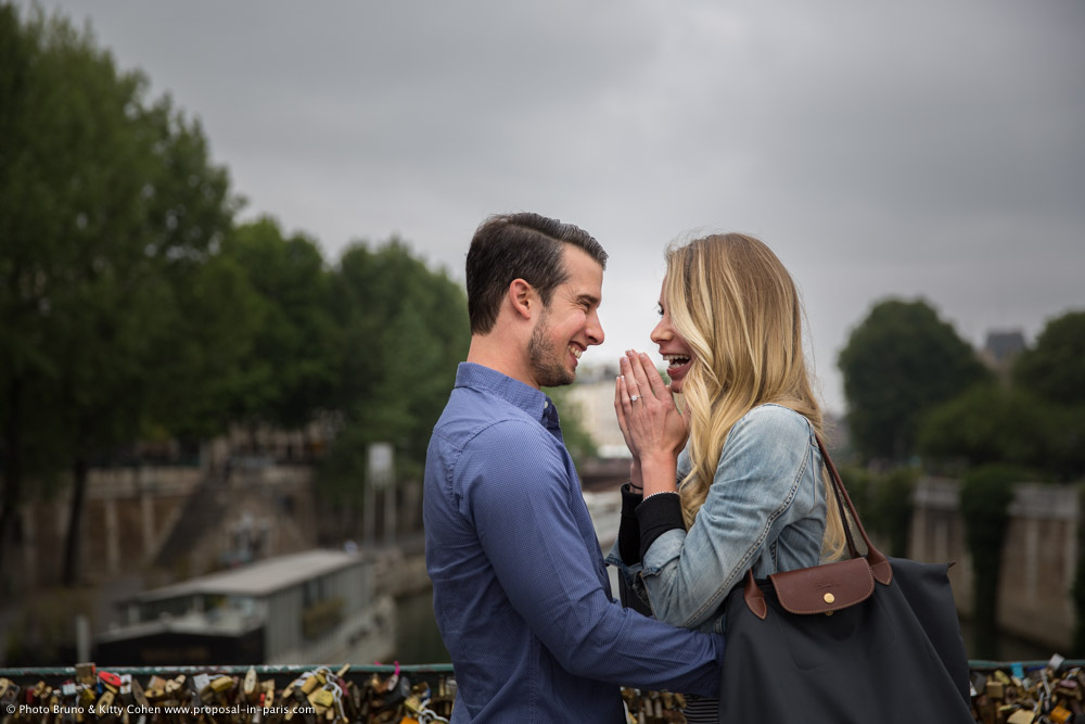 portrait couple face to face lady cry surprise proposal in paris